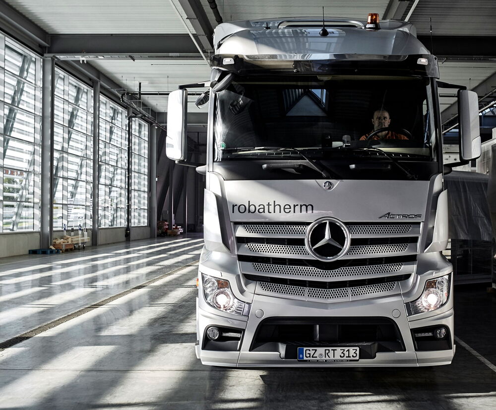 And off they go: robatherm trucks shuttle daily between the plants to transport materials. And off they go: robatherm trucks shuttle daily between the plants to transport materials.